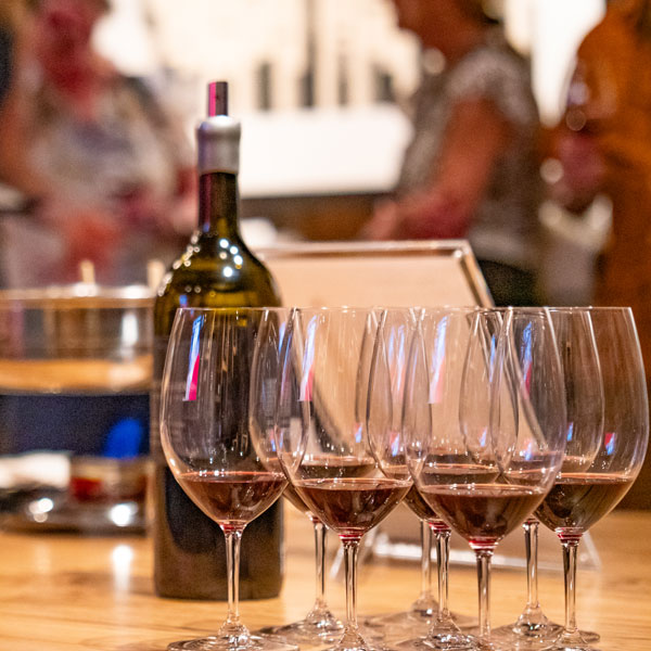 Wine glasses on the bar at Amaterra Kitchen + Social Club